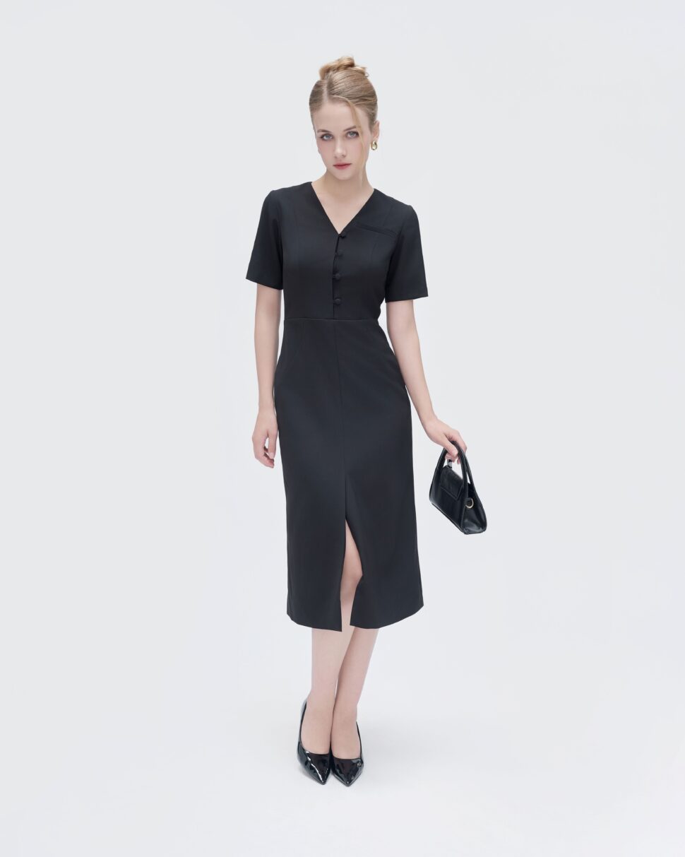 Classic black dress with a back slit for easy movement