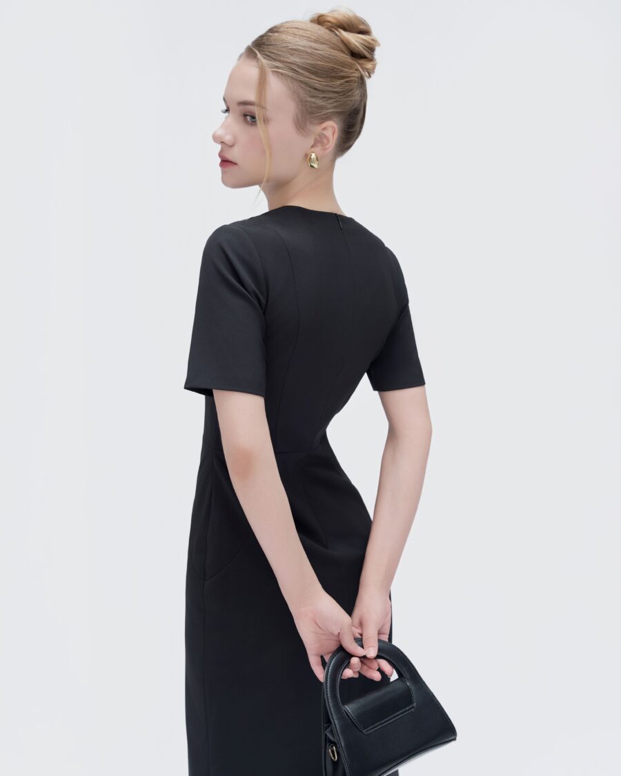 Short sleeve vintage black dress featuring a classic design