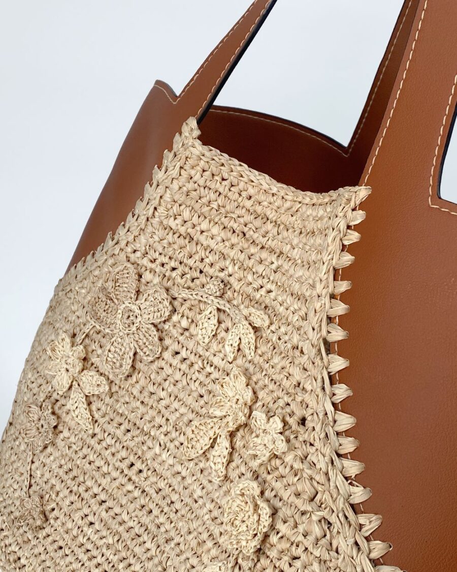 The Alazne Natural Raffia Bag zoom in close floral details0-microfiber leather texture